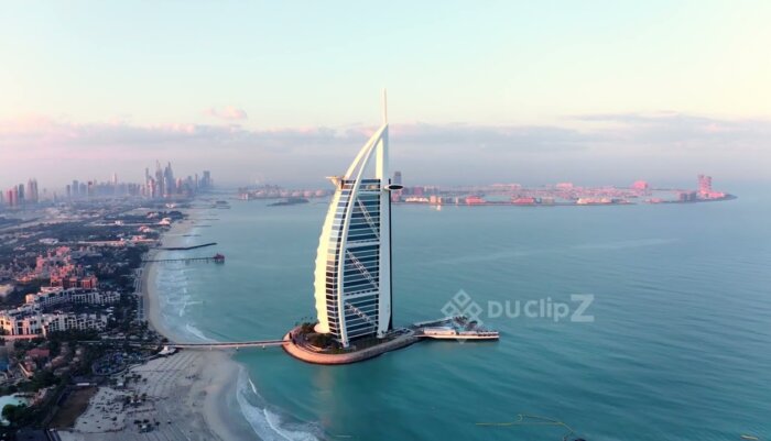 Elegant 4K Drone Flyover of Burj al Arab with Ocean Backdrop | 4k Video Stock Footage
