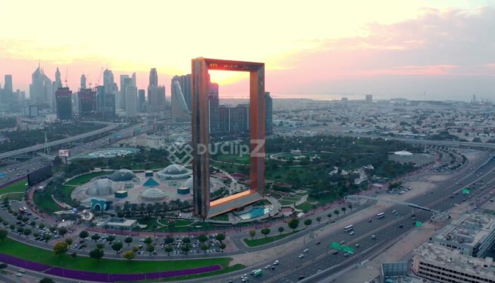 Golden Hour Aerial Views of Dubai Frame Surrounded by Cityscape