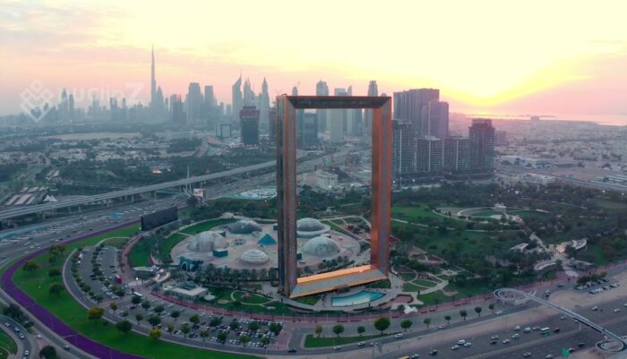 Aerial Twilight Views of the Dubai Frame Illuminated at Night - Dubai Frame drone footage
