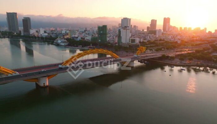 Cinematic Aerial Views of Da Nang Dragon Bridge with River Reflections