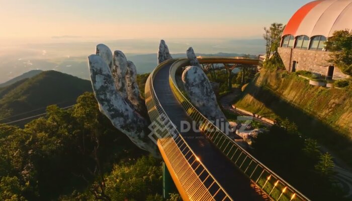 Sunset Aerial Views Highlighting Da Nang Golden Bridge's Glow