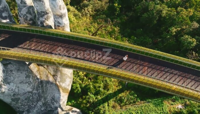 Elegant Aerial 4K Footage of Da Nang Golden Bridge Over Turquoise