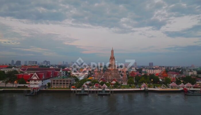 Stunning 4K Drone Sunrise Over Wat Arun and Chao Phraya River - Wat Arun Drone
