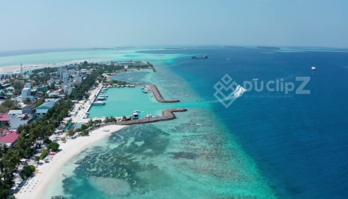 Aerial Drone Capture of Maafushi Island Maldives with Ocean Waves
