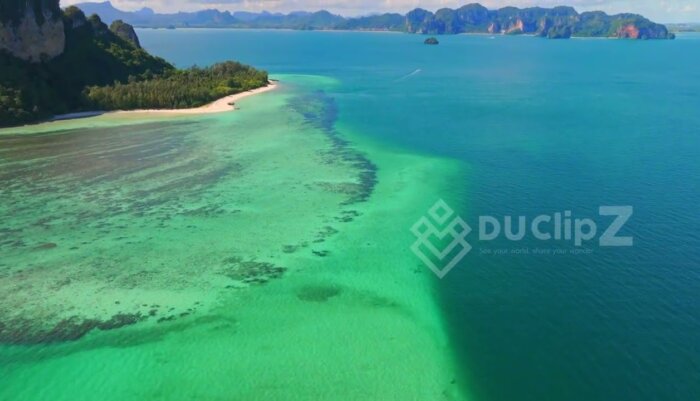 Drone Footage Over Krabi’s Clear Blue Waters and Coastal Landscape