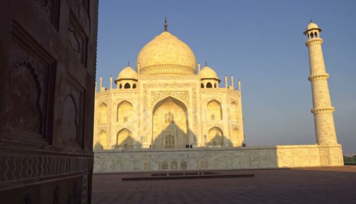Sunrise Views Highlighting Taj Mahal's Silhouette and Reflecting Pools