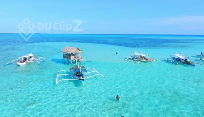 Aerial Views of Balabac’s Crystal Clear Waters and Island Sandbanks - Balabac Drone Footage