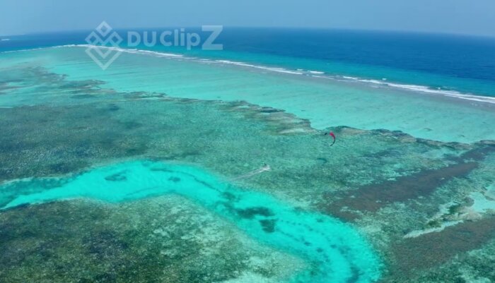 Aerial View of Maldives Island with Crystal Clear Blue Waters
