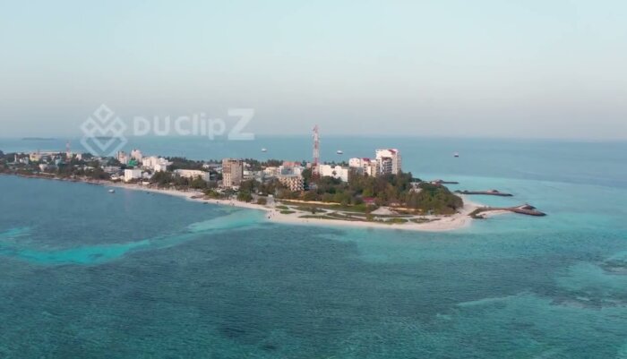 Maldives Island with Turquoise Waters and Dynamic Ocean Waves
