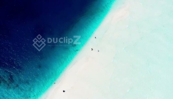 Drone Captures Maldives Sandbank with Vibrant Clear Blue Waters