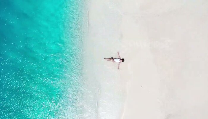 Maldives Sandbar and Ocean Waves Captured in Smooth 4K Drone Footage