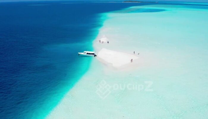 Aerial 4K Footage of Maldives Sandbar with Turquoise Ocean Waves
