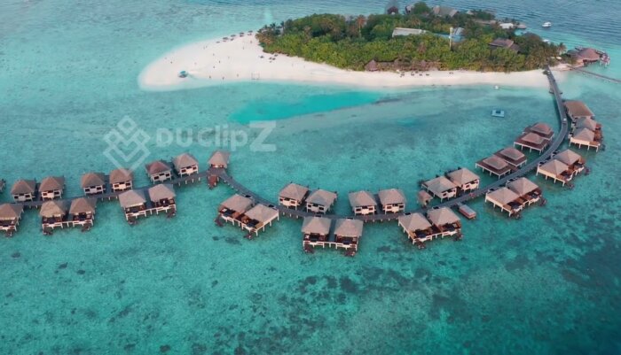 Luxury Maldives Resort Surrounded by Pristine Turquoise Waters 4K