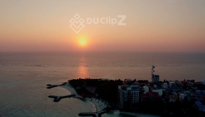 Sunset Views Over Maldives' Crystal Clear Lagoons and Gentle Waves