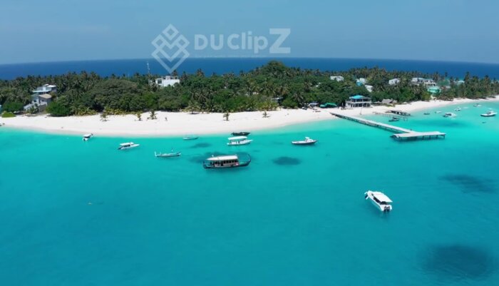 Stunning Maldives Island and Crystal Clear Waters in Smooth 4K Drone Footage