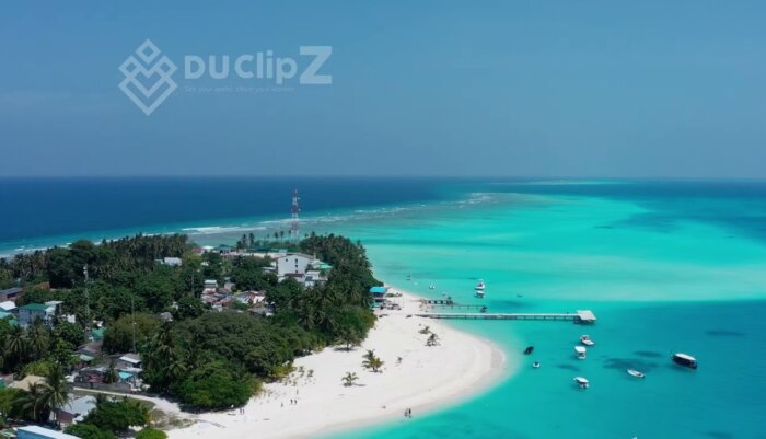 Dynamic Action Over Turquoise Maldives Waters in 4K Drone
