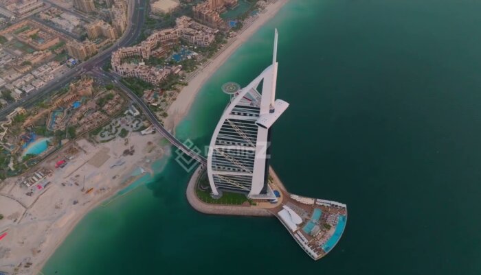 Free Drone footage Dubai - Captures Burj al Arab Silhouette During Twilight in 4K