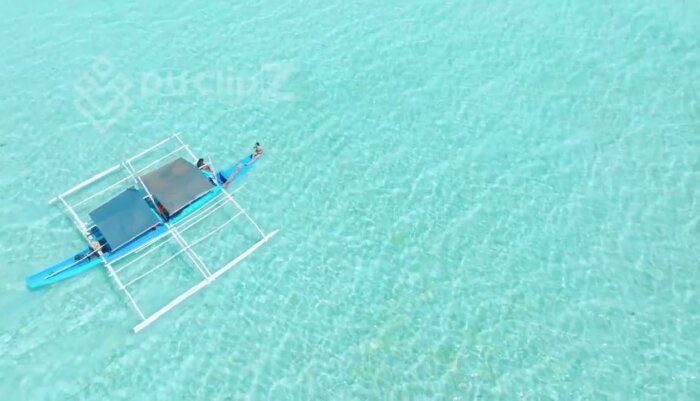 Drone Footage of Balabac - Turquoise Sea and Floating Boat Path